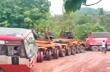 Traffic disrupted as huge container lorry gets stuck in slush on Charmady Ghat