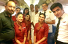 Air India Express crew honour Padma Shree Harekala Hajabba