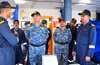 Coast Guard Commander reviews operational preparedness and infrastructure projects