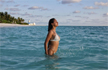 Disha Patani oozes oomph in racy white bikini, see her sexiest swimwear pictures
