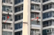 Woman falls off 9th-floor balcony after argument with husband