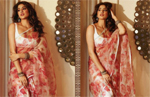 Janhvi Kapoor blooms like a garden full of roses in a floral-printed silk saree