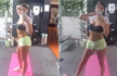 Nora Fatehi looks hot in black sports bra and neon shorts at the gym