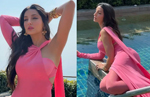 Nora Fatehi looks sultry lounging by a pool in bodycon dress; Watch hot video