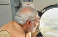 PM Modi surveys flooded Chennai, announces Rs 1000 Cr
