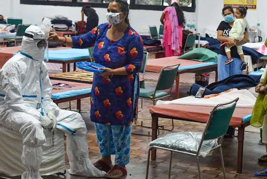 India records 52,000 new Coronavirus cases and 803 deaths, tally over 18.5 lakh
