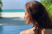 Malaika Arora shares sun-kissed Pic in swimwear