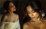 Malaika Arora oozes oomph in bridal gown as she walks the ramp, see photos