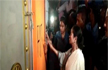 Mamata Banerjee breaks open BJP office, paints party symbol on wall