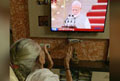 Narendra Modi took oath, his Mother watched from miles away