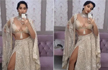 Nora Fatehi gives her lehenga a daring new twist with a thigh high slit on the side