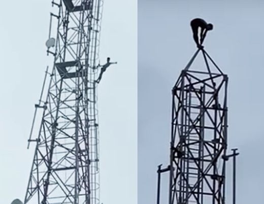 Man climbs a mobile tower