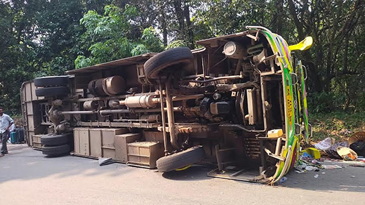 Private Bus Overturns at Charmadi Ghat
