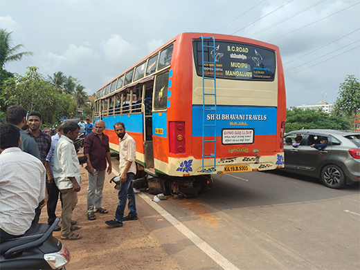 Scooter Rider Escapes After Falling Under Bus