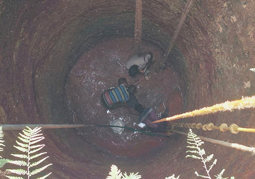 Three Workers Trapped in Temple Well