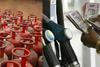 Petrol price hiked by 75 p, diesel by 50 p; LPG cut by Rs 45