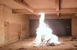 Miscreants set afire to MUDA market building at Suratkal