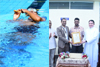 Mangaluru music teacher sets world record for 700m backstroke while playing flute