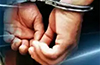 Man arrested on charge of misbehaving with woman on moving bus