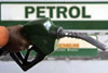 Petrol price hiked by Rs 1.55 per litre