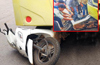 Women on scooter miraculously escape getting crushed by a bus