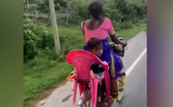 Mother makes an innovative backseat for her child on bicycle, Internet finds it impressive, Watch