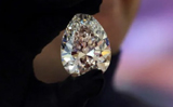 Giant white diamond �The Rock� makes debut in Dubai, expected to fetch $30 Million at auction