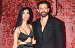 At Karan Johars 50th birthday bash, Hrithik poses with GF Saba Azad