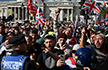 Violence mars Tommy Robinson rally in London; 26 police officers injured