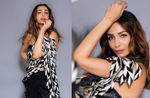 Malaika Arora looks uber glam in black saree with feather pallu, see pics