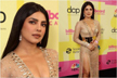 Priyanka Chopra looks dazzling on BBMAs Red Carpet in plunge dress with thigh-high slit