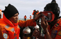 Rescuers recover 22 bodies as hunt intensifies for AirAsia jet