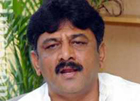 Disgruntled Shivakumar at last takes oath