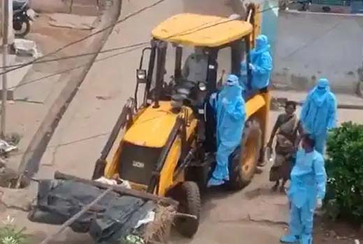 Earthmover used to take Coronavirus patients body to crematorium in Andhra Pradesh