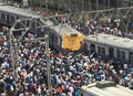 A Mumbai local train derails, hit by another