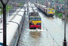 Mumbai rains hit rail, road traffic, cause landslide