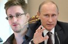 Putin says Snowden at Moscow airport, rejects extraditio