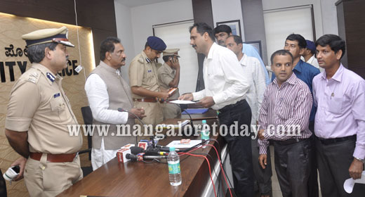 K J George in Mangalore Commissioner office