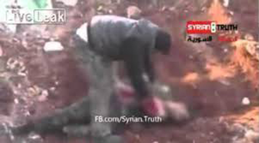 syria_rebel_eating Heart